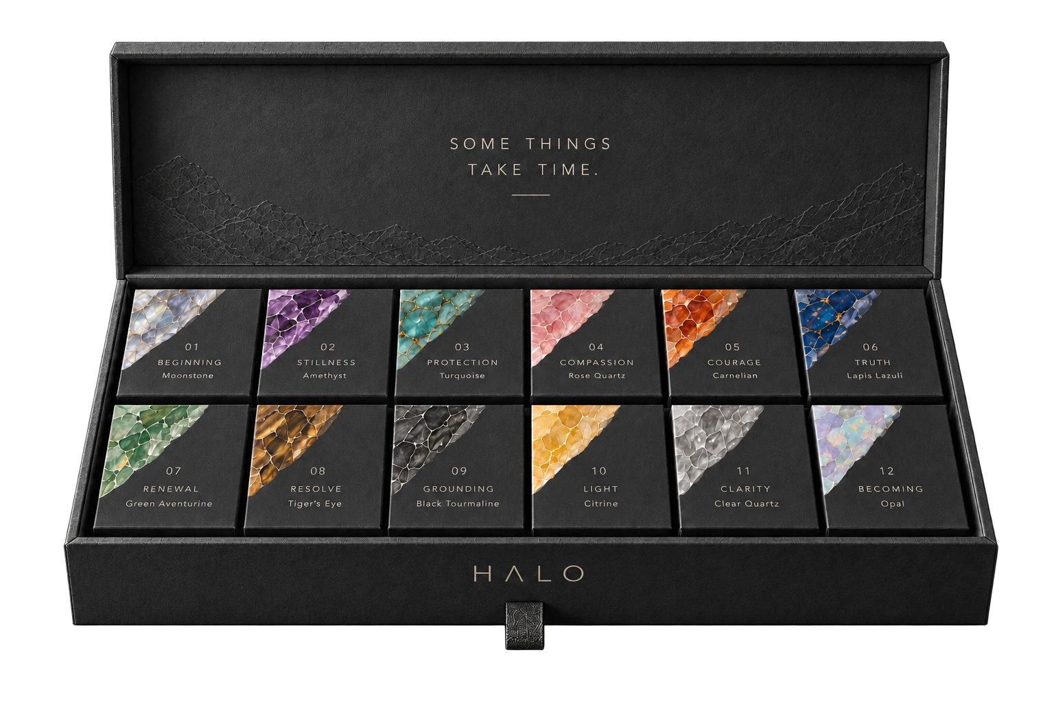 Halo Year One charcoal presentation case with twelve numbered stone boxes